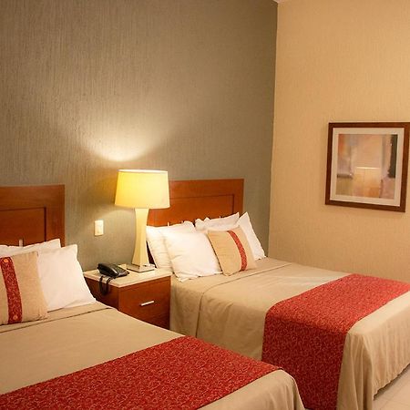 Hotel Fenix Лос-Мочис Экстерьер фото