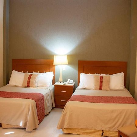 Hotel Fenix Лос-Мочис Экстерьер фото